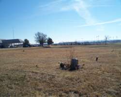 The cemetery lies at the unbounded open field in a residential area The cemetery lies at the unbounded open field in a residential area.